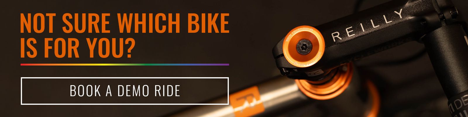 Bicycle handlebar with 'Reilly' branding and promotional text for demo ride booking on a dark background.