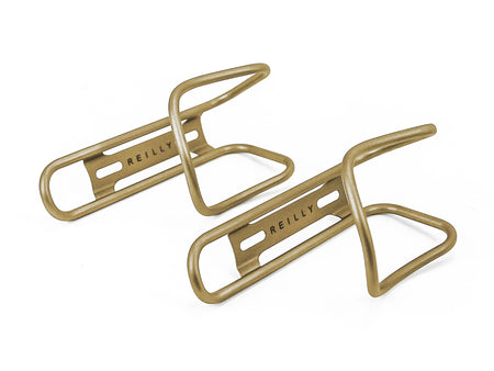 Gold  ti bottle cages on a white background