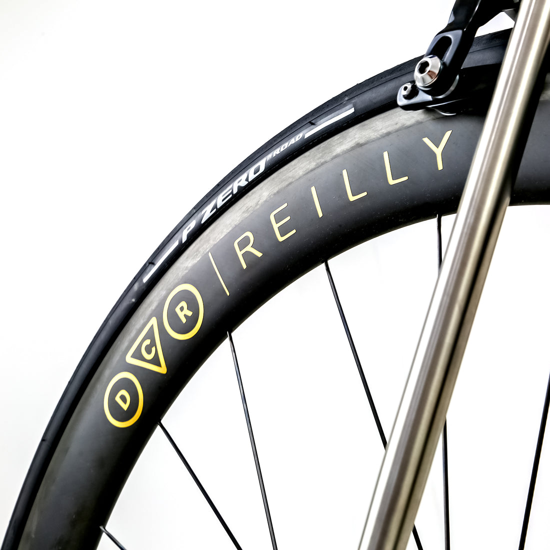 Reilly road bike carbon rims with gold branding 