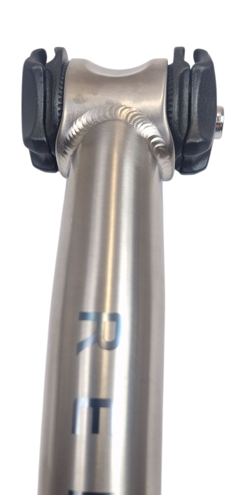 Titanium seat post with weld and black clamps on a white background