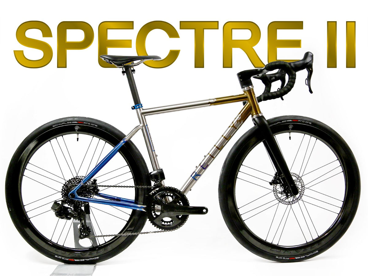 Spectre II bicycle on a white background with gold text