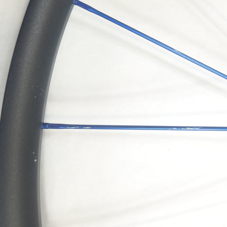 Close-up of a spoke on a white background