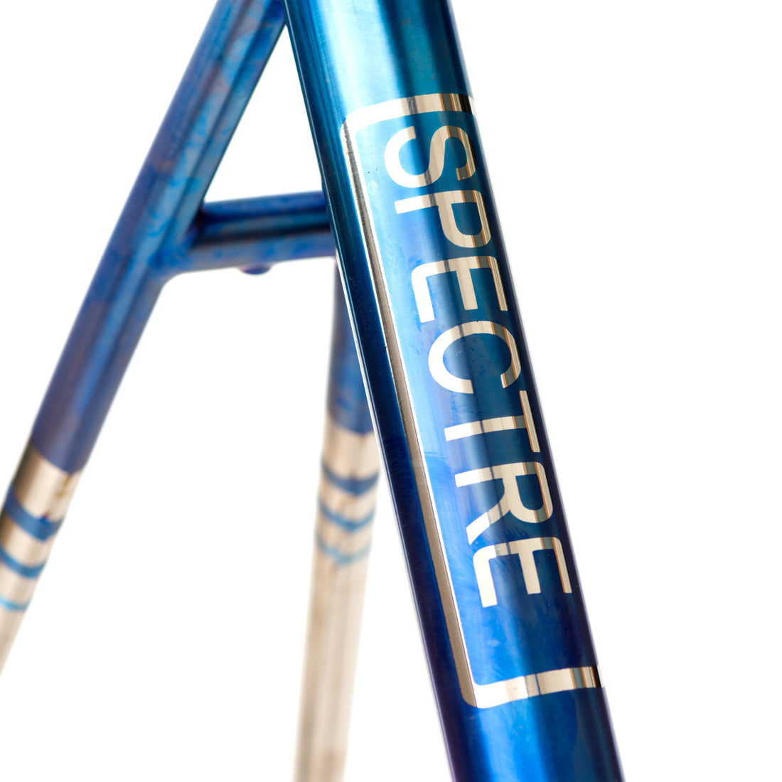 Blue anodised graphics on to a titanium bike frame