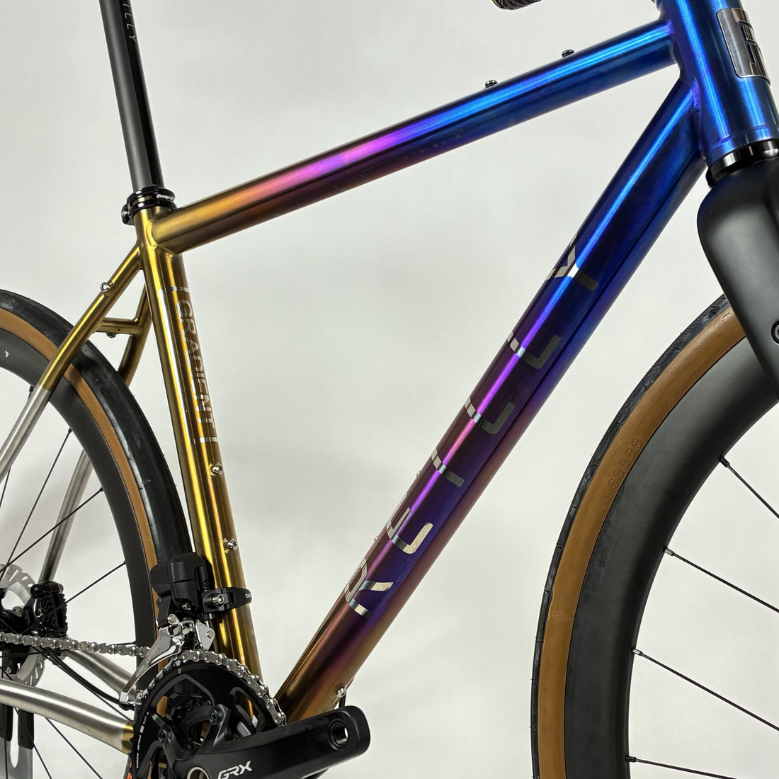 Close-up of a bicycle with a colorful frame on a white background