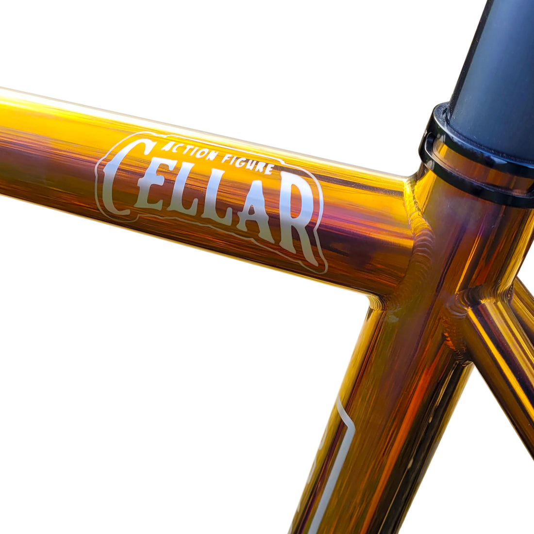 Golden polished titanium road bike with a custom logo