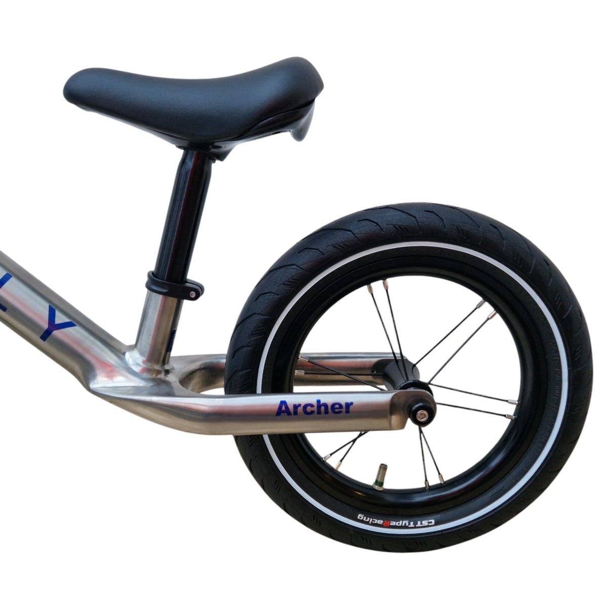the back wheels of a titanium balance bike on white.