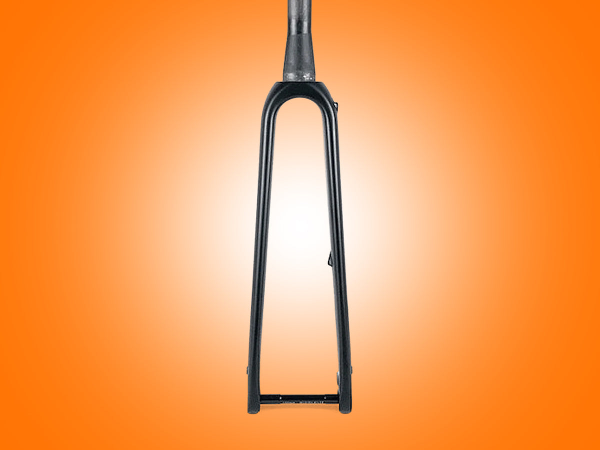 Black bicycle fork on an orange gradient background