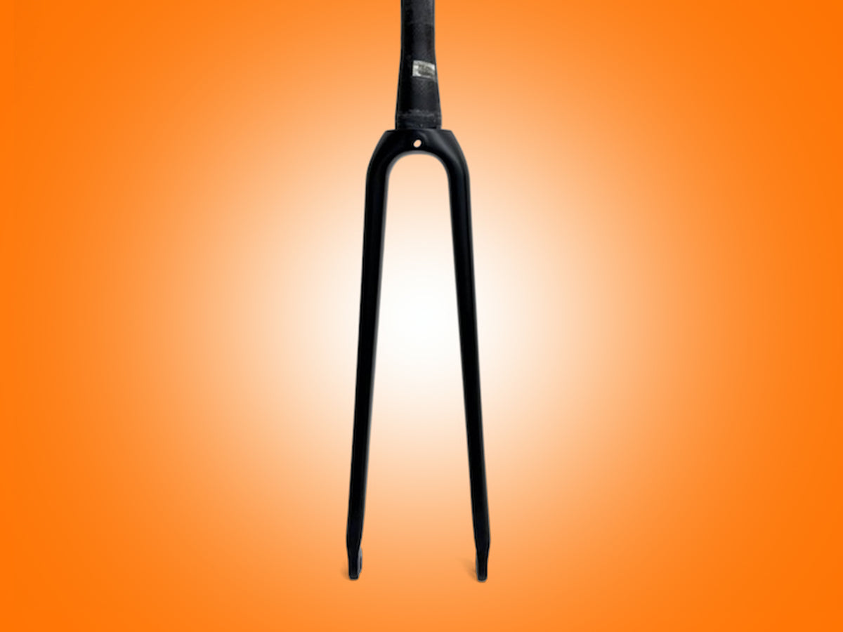 Black bicycle fork on an orange gradient background