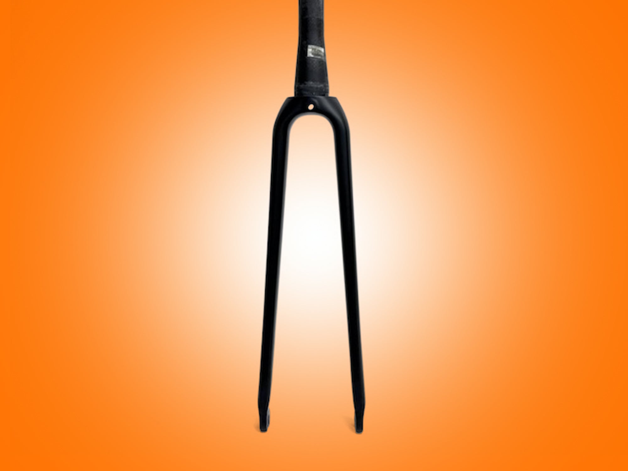 Black bicycle fork on an orange gradient background