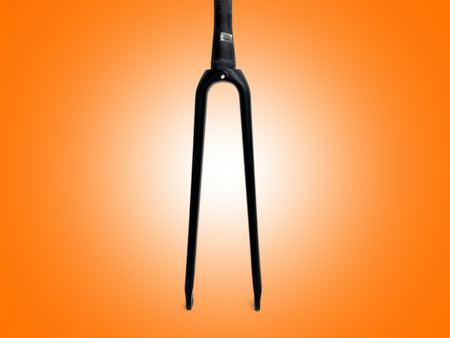 Black bicycle fork on an orange gradient background
