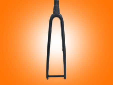 Black bicycle fork on an orange gradient background