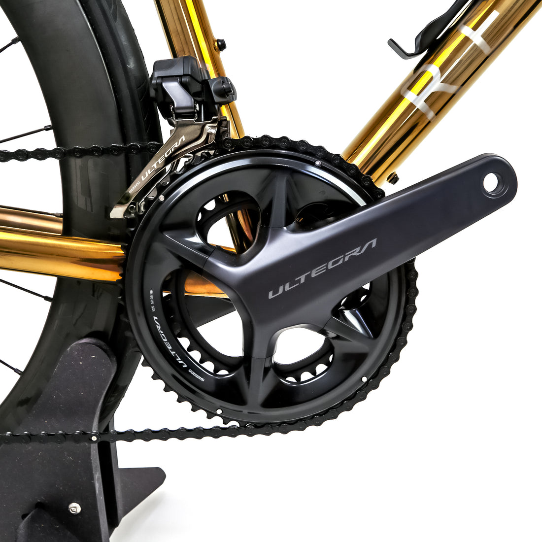 Polished gold Reilly road bike with Shimano Ultegra cranks