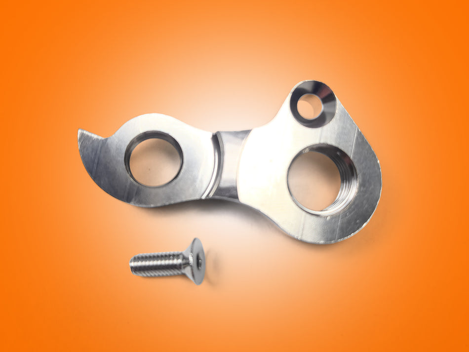 Metal linkage mechanism with a screw on an orange background