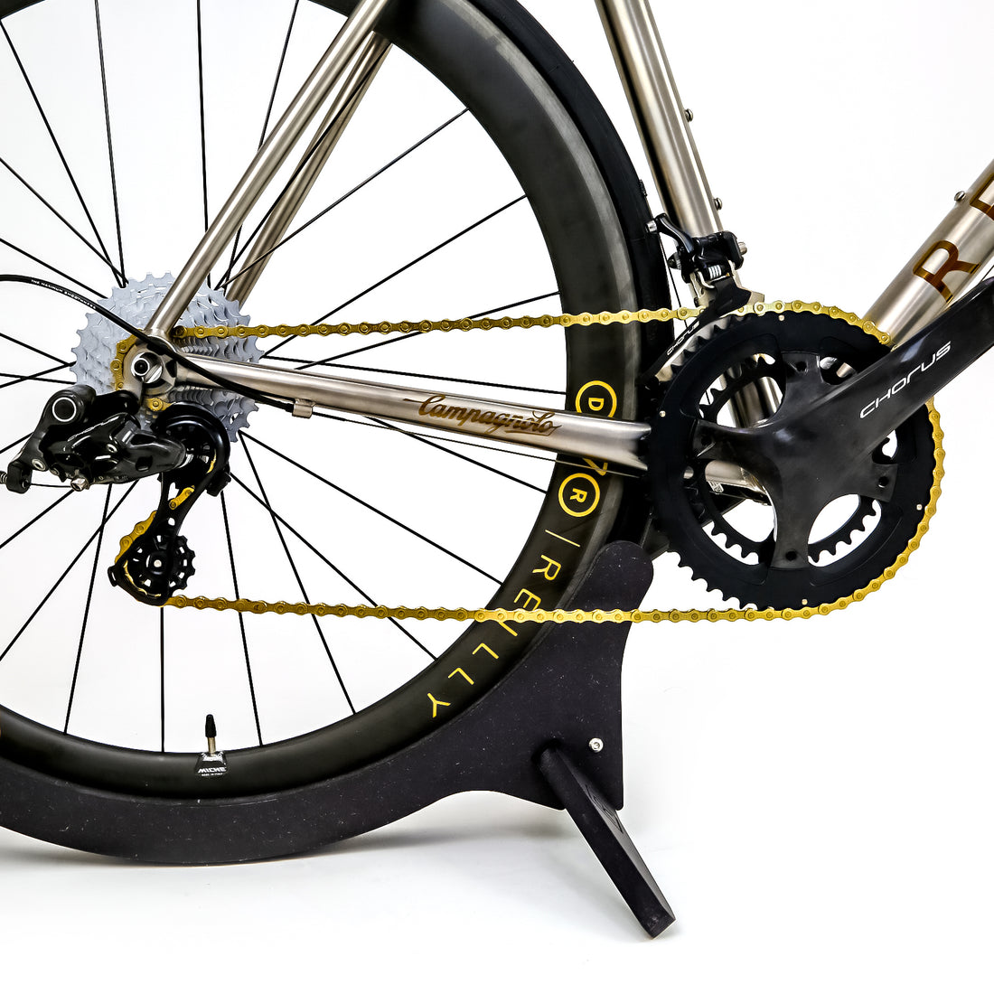 Reilly road bike with gold chain and decals
