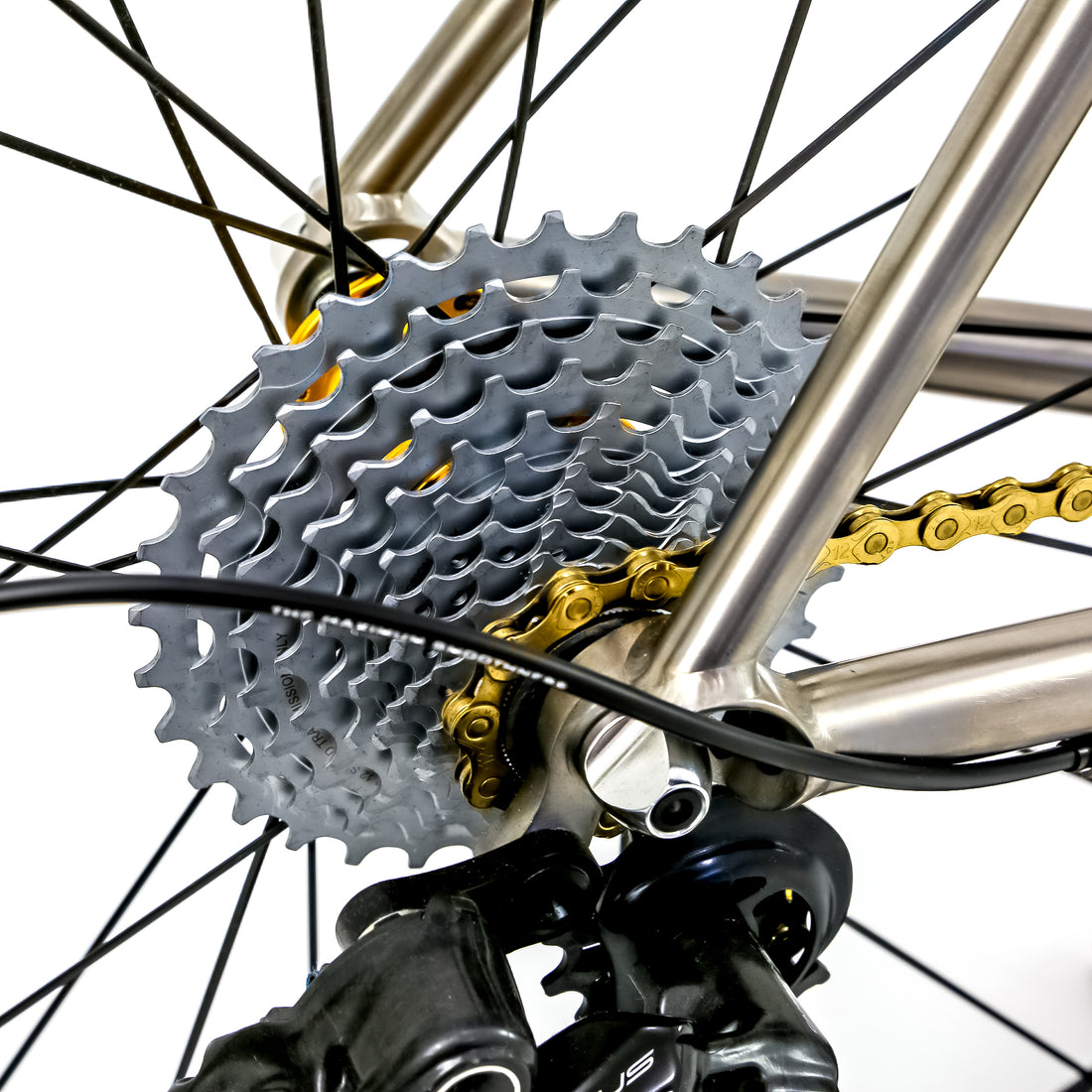 Reilly road bike with a gold chain and wheel hubs