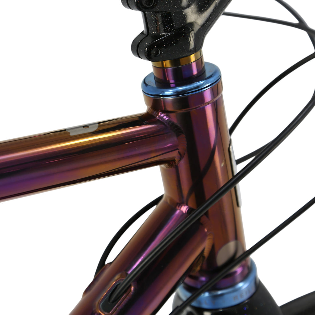 Titanium bike frame with a deep purple , bronze and blue finish