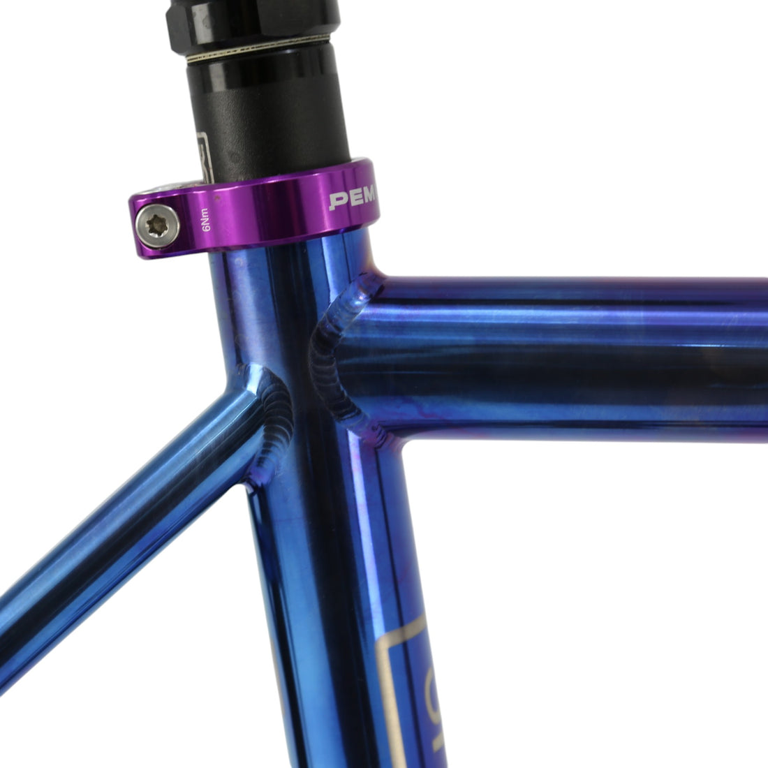 Blue anodized titanium road bike with a purple seat post clamp 