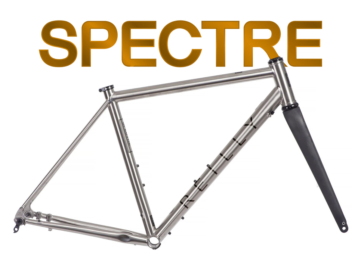 Bicycle frame with 'SPECTRE' branding on a white background