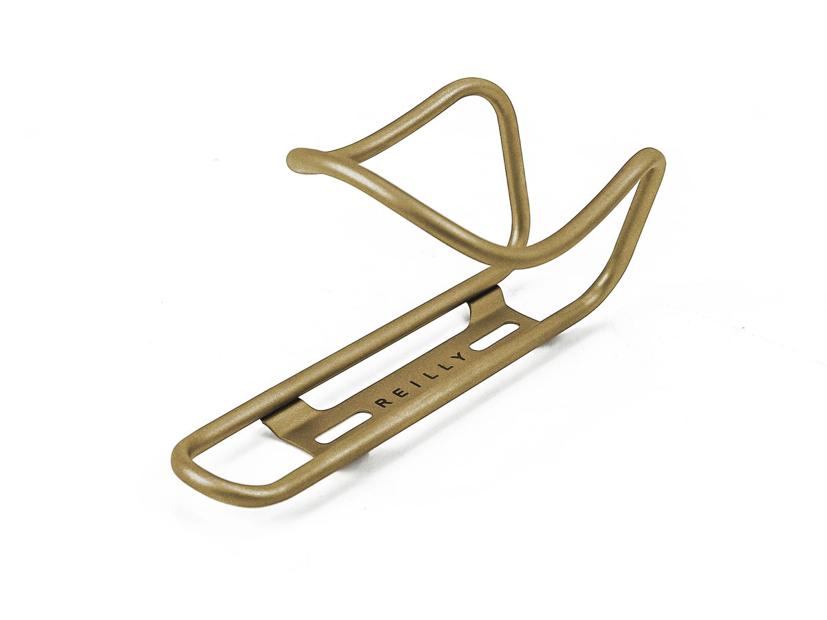 Gold  ti bottle cage on a white background