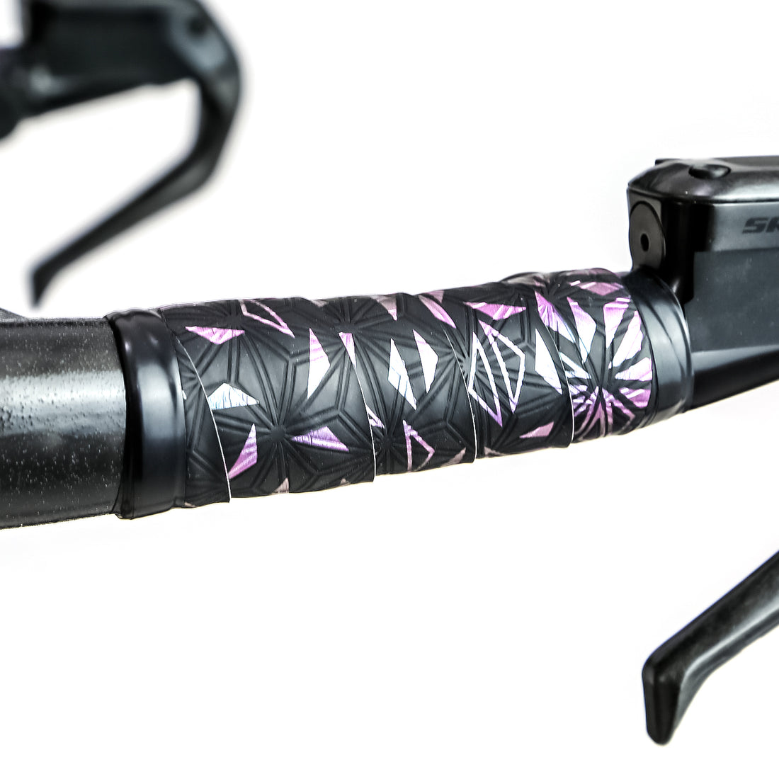 titanium time trial bike with pink custom bar tape