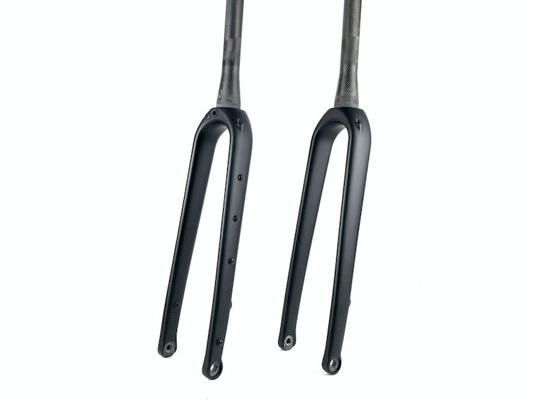 Black carbon fibre bicycle forks with eyelets and thru axle