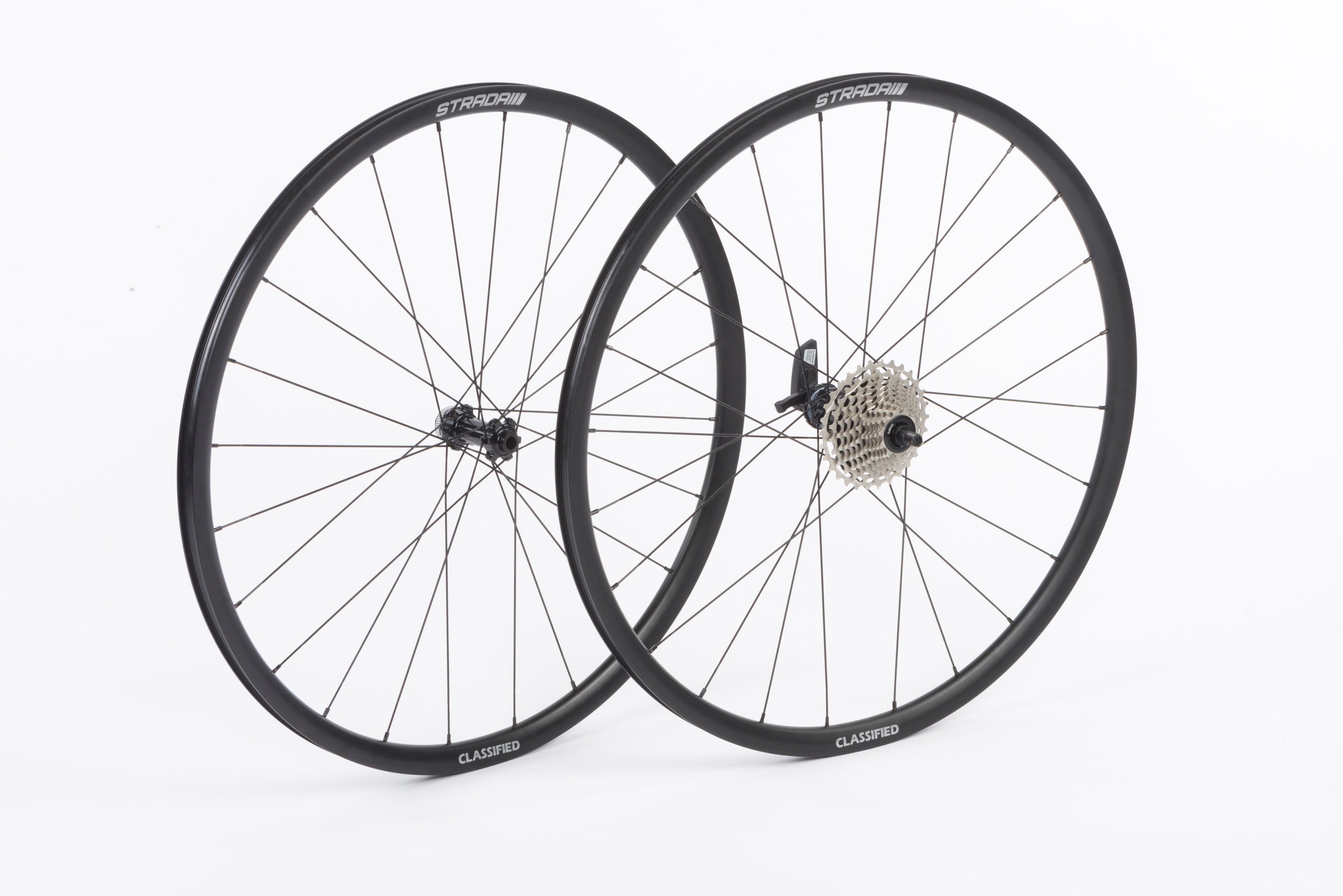 A picture of 2 bike wheels on a white background 