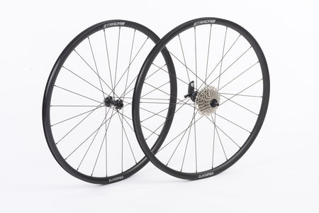A picture of 2 bike wheels on a white background 