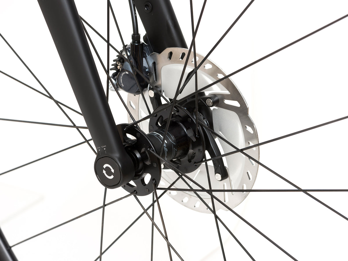close up of the Reilly carbon adventure forks on a titanium gravel bike 